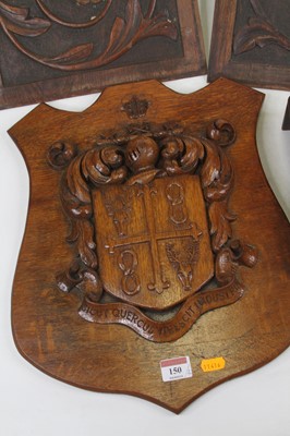 Lot 150 - A carved oak coat of arms, 40 x 33cm; together...