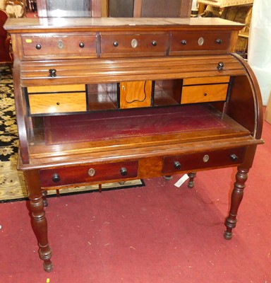 Lot 1400 - A late Victorian mahogany cylinder desk,...