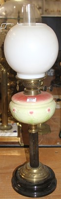 Lot 167 - A 19th century brass oil lamp, having a milk...