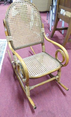 Lot 1369 - An early 20th century stained bamboo cane back...