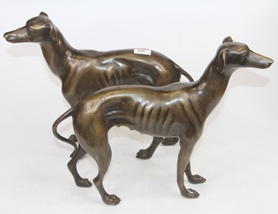 Lot 168 - A pair of bronzed metal models of greyhounds,...
