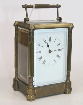 Lot 213 - A brass carriage clock, the enamel dial...