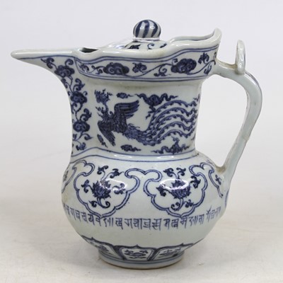 Lot 222 - A Chinese blue and white porcelain ewer,...