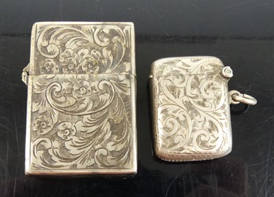 Lot 318 - A silver and engraved pocket vesta case 37mm,...