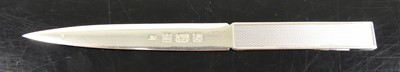 Lot 326 - A modern silver paper knife with engine turned...