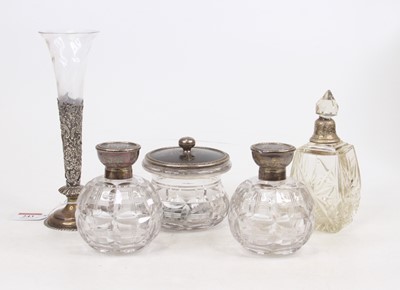 Lot 243 - A set of three piquework and glass dressing...