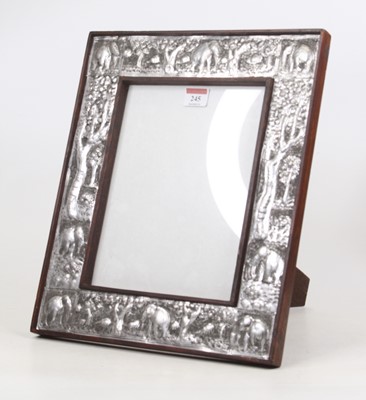 Lot 245 - A white metal photograph frame, repousse...