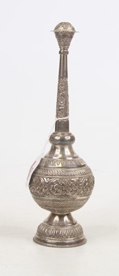 Lot 246 - An Eastern white metal floral decorated...