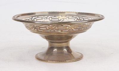 Lot 249 - A George V pierced silver bonbon dish,...