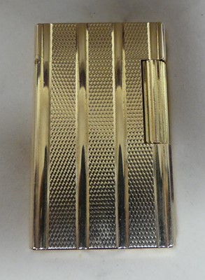 Lot 360 - S.T. Dupont of Paris - a gilt metal pocket...