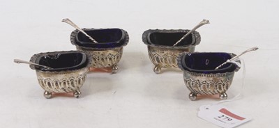 Lot 279 - A set of four George V silver table salts,...