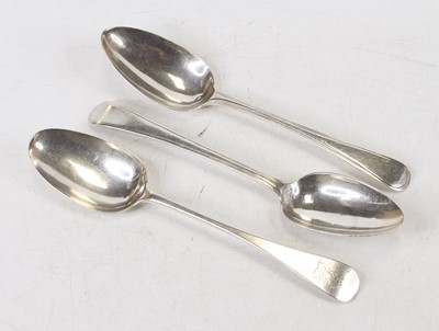 Lot 288 - A near-pair of George III silver tablespoons...