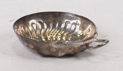 Lot 303 - A modern silver tastevin with applied snake...