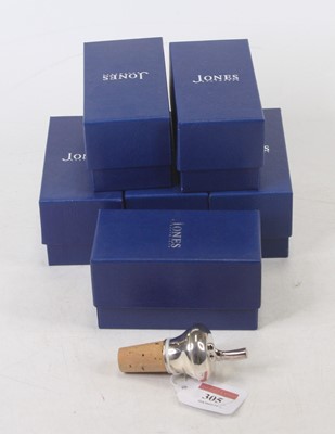 Lot 305 - A modern silver topped wine bottle cork,...