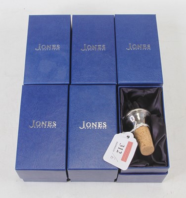 Lot 312 - A modern silver topped wine bottle cork,...