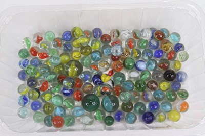 Lot 396 - A collection of assorted glass marbles, in...