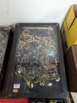 Lot 422 - A glazed table top display case containing a...