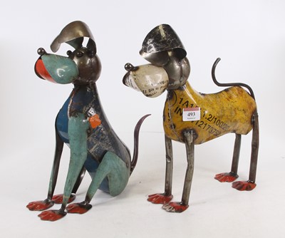 Lot 493 - A painted metal novelty dog, in standing pose,...