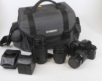 Lot 470 - A Canon EOS 1000F 35mm SLR camera with bag and...