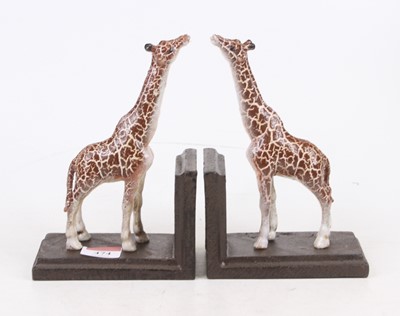 Lot 474 - A pair of reproduction cast iron bookends, as...