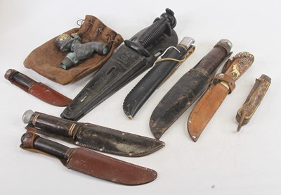 Lot 514 - Assorted bowie and hunting knives in leather...