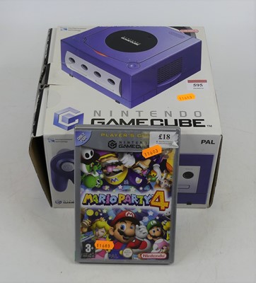 Lot 595 - A boxed Nintendo Game Cube (PAL), together...