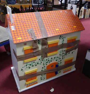 Lot 646 - A child's wooden dolls house with various...