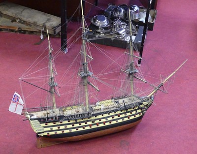 Lot 652 - A wooden kit built model of HMS Victory,...