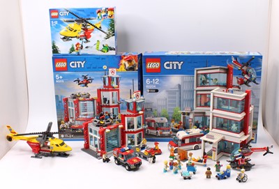 Lot 670 - A collection of Lego City constructed sets to...