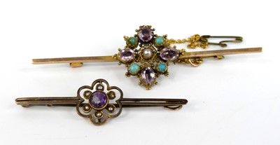 Lot 2502 - Two yellow metal bar brooches, the first...