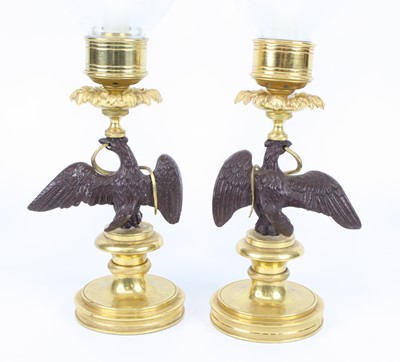 Lot 5 - A pair of bronze and gilt brass pedestal...