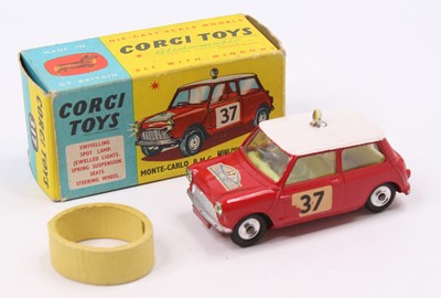 Lot 1371 - Corgi Toys No.317 B.M.C Mini Cooper with red...