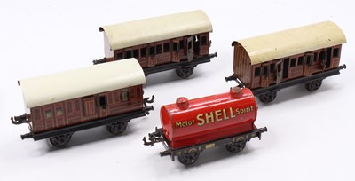 Lot 208 - Four items of Bing rolling stock: three...