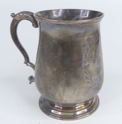 Lot 1155 - An early George III silver bell shape tankard,...