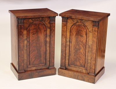 Lot 1560 - A pair of circa 1830 mahogany cupboards, each...