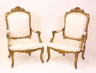 Lot 1537 - A pair of circa 1900 French gilt wood fauteuil,...