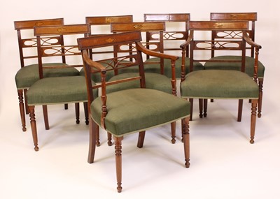 Lot 1557 - A set of eight late Georgian mahogany dining...