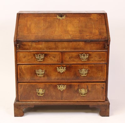 Lot 1538 - An early 18th century walnut writing bureau...