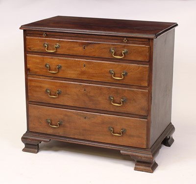 Lot 1553 - An early George III mahogany chest, the top...