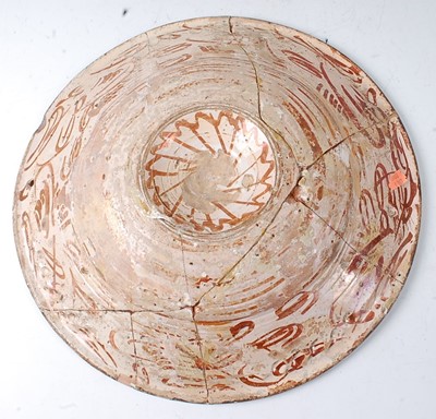 Lot 1090 - An Hispano-Moresque copper lustre earthenware...