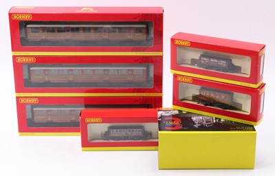 Lot 482 - Three Hornby coaches and three coal wagons:...