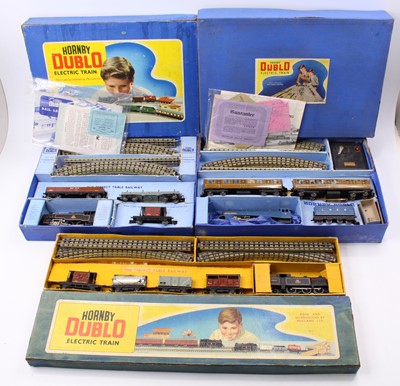 Lot 560 - Three Hornby-Dublo 3-rail train sets: EDG17...