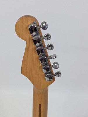 Lot 521 - A Squier by Fender stratocaster electric...