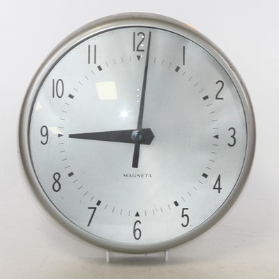 Lot 527 - A Magneta metal cased wall clock, having...