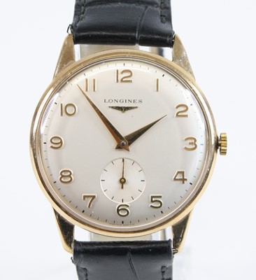 Lot 1345 - A gent's Longines 9ct gold cased manual wind...