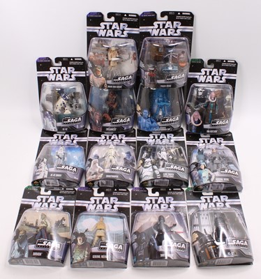 Lot 819 - A collection of 14 various carded Star Wars...