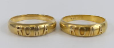 Lot 2518 - Two yellow metal bands each with Roma in...