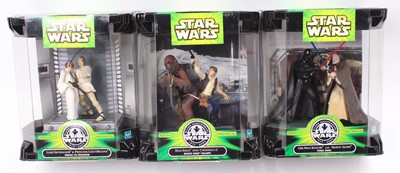 Lot 737 - A collection of three Star Wars Hasbro silver...