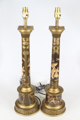 Lot 15 - A pair of table lamps, each in the form of a...
