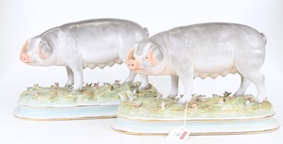 Lot 16 - A pair of 20th century porcelain models of...